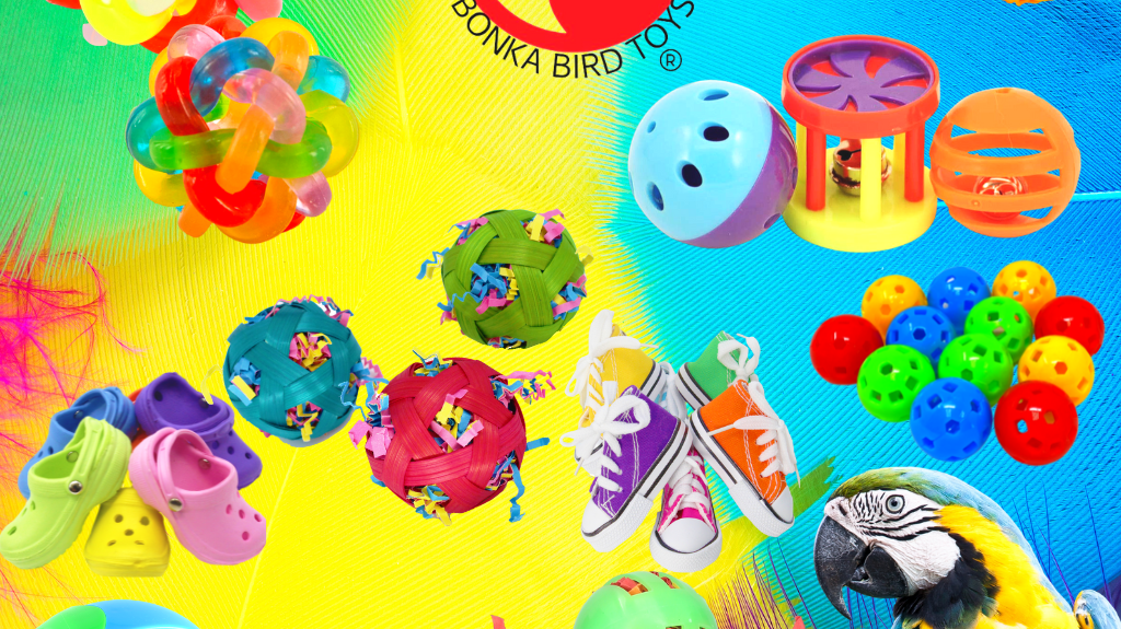 Assorted colorful bird toys from Bonka Bird Toys including chews, puzzles, and interactive play items.