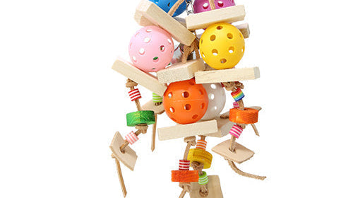 Colorful 3655 Sixball parrot toy hanging with wooden pieces and various balls for birds.