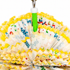 Yellow Paper Puff Bird Toy hanging in a bird cage