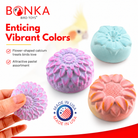 Flower-shaped calcium bird treats in pastel pink, purple, blue, and orange for parrot enrichment