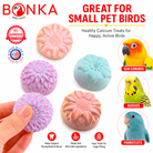 Flower-shaped calcium bird treats in pink, purple, blue for small pet birds like budgies and parrotlets