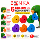 Colorful wooden heart bird toys for parrots to chew and play with, promoting enrichment and activity.