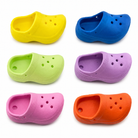 Colorful plastic bird toy clogs in yellow, blue, green, purple, pink, orange for parrot enrichment