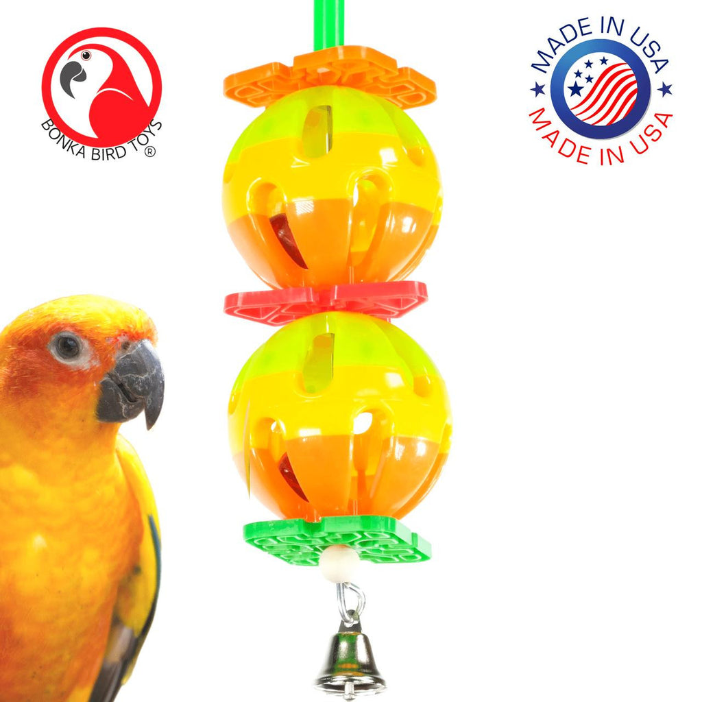 The 1570 Twin Ball a colorful and pleasing edition for your medium sized pet, two colorful rattle balls are pieced together with colorful plastic discs and it is finished out with a medium sized bell.