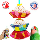 The 1932 Two Cake from Bonka Bird Toys is a colorful and shreddable medium sized bird toy! This toy has (2) natural sola balls and easy to shred colorful cup cakes